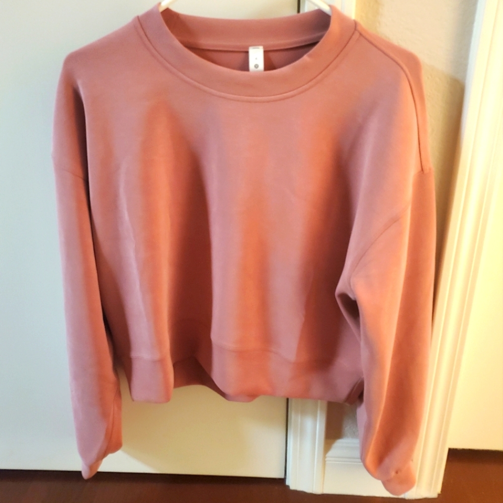 Coral lululemon sweater, size 6, never worn